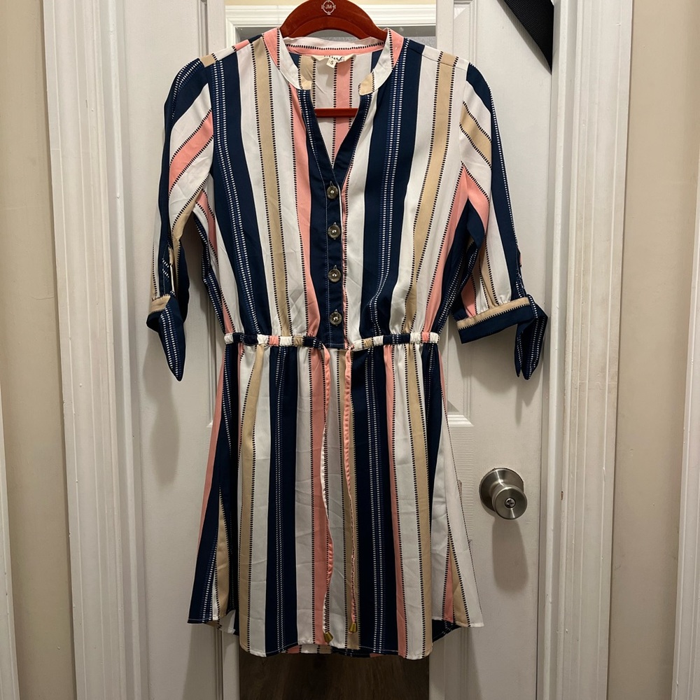 Blush multi-color strap long sleeve dress.